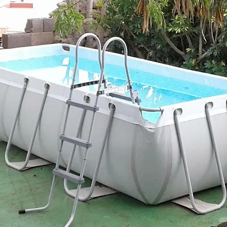 Casa Con Terrazas,jardin Y Piscina En La Camella. Hébergement de vacances